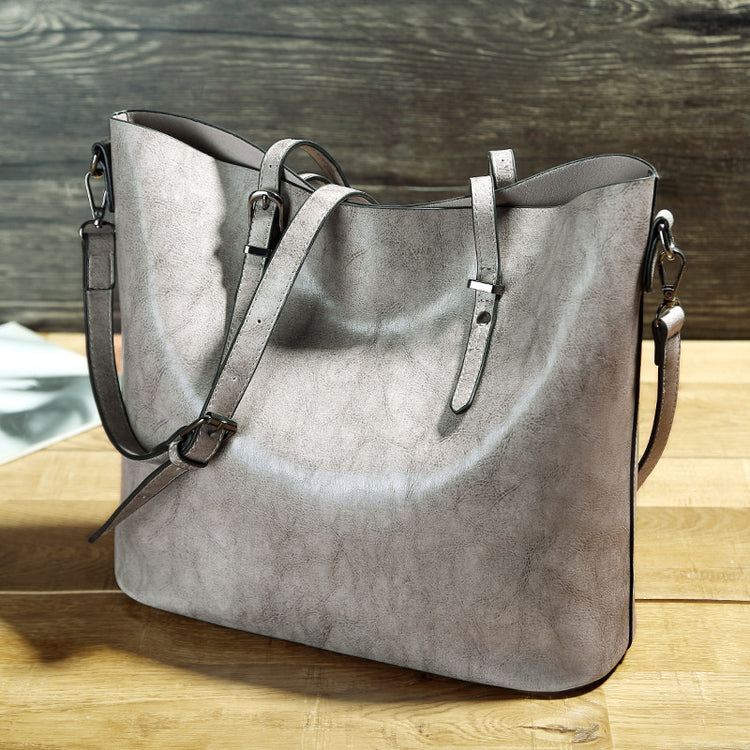 Women’s oil wax leather high-capacity shoulder messenger tote bag.