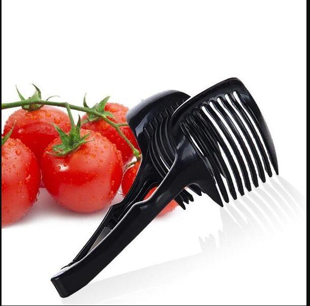 Plastic fruit and vegetable cutting holder with slicing guide slots