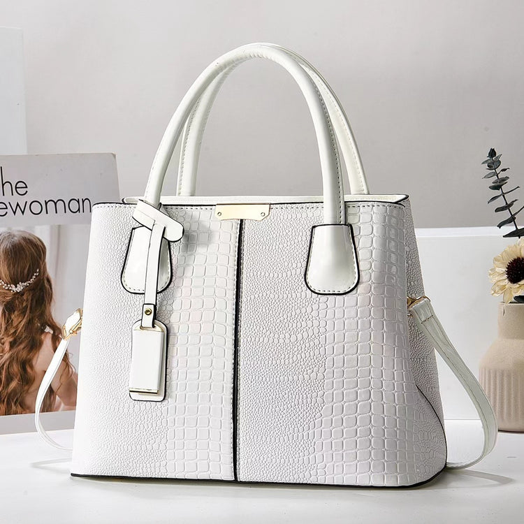 Women’s soft PU large-capacity minimalist handbag.