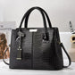Women’s soft PU large-capacity minimalist handbag.