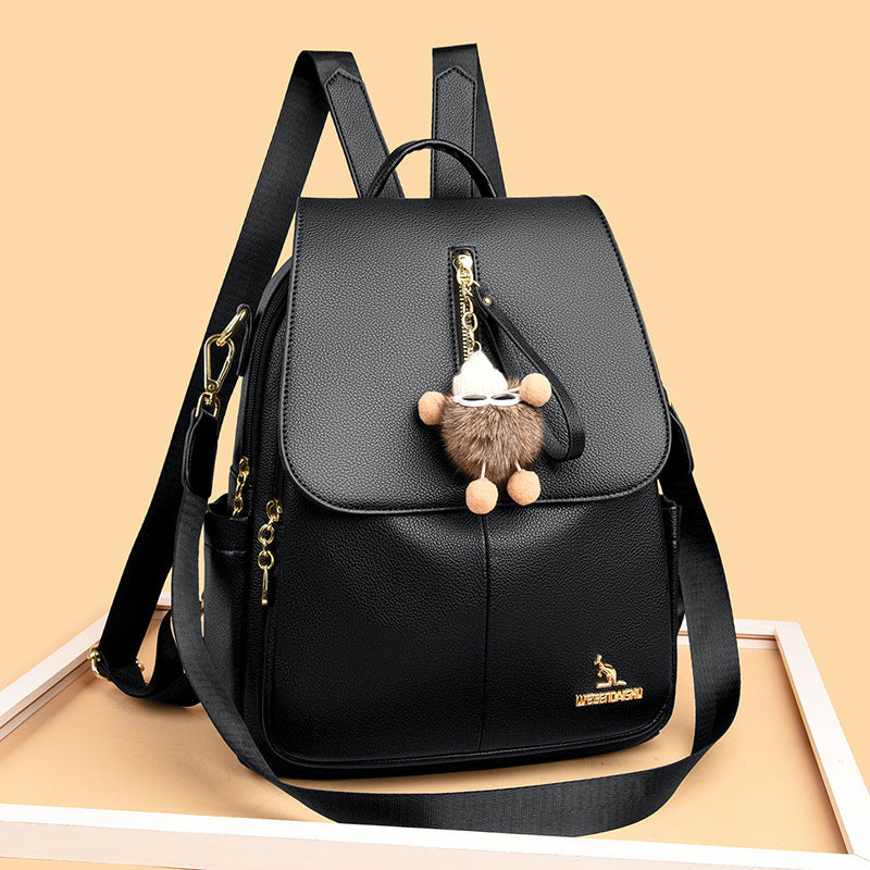 Women’s genuine leather backpack with pendant, soft and anti-theft design.