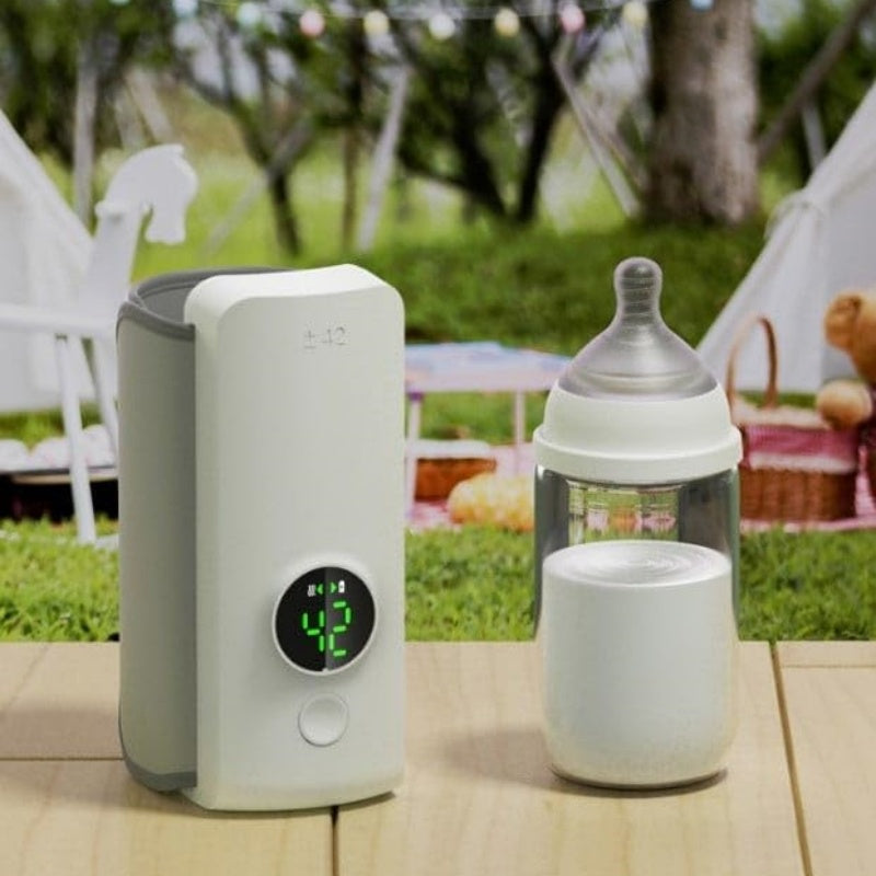 Portable USB baby bottle warmer with wrap-around heating design.