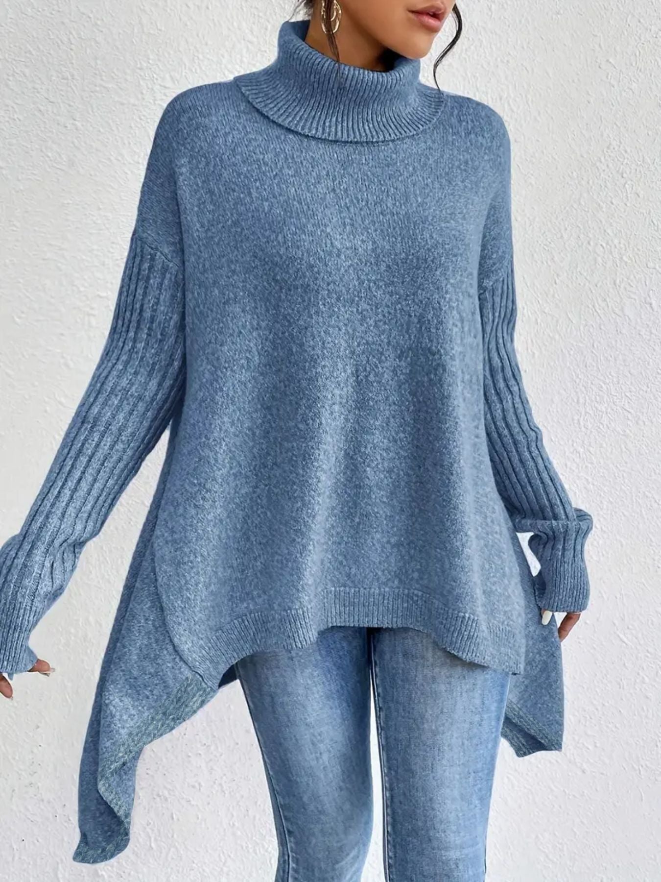 Women’s irregular turtleneck long sleeve loose knit sweater.