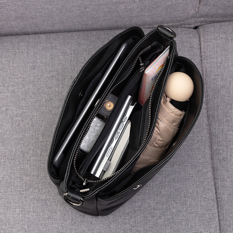 Women’s genuine leather cowhide crossbody handbag with minimalist plaid design