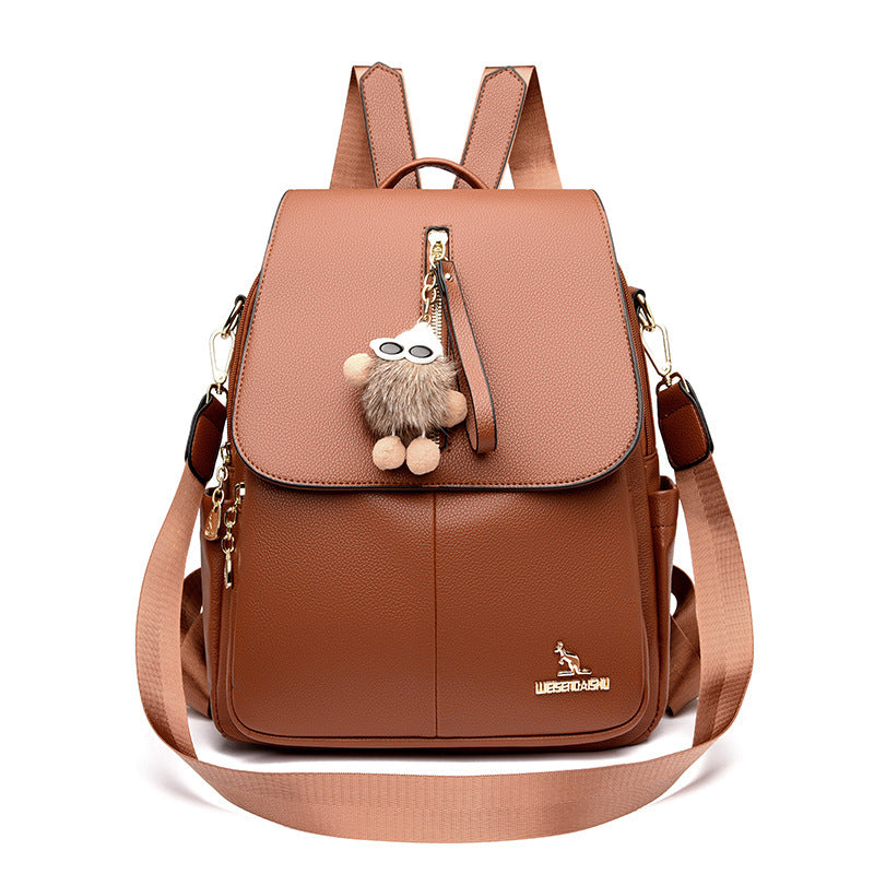 Women’s genuine leather backpack with pendant, soft and anti-theft design.