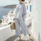 Women’s summer striped batwing sleeve top with solid straight-leg pants two-piece set.