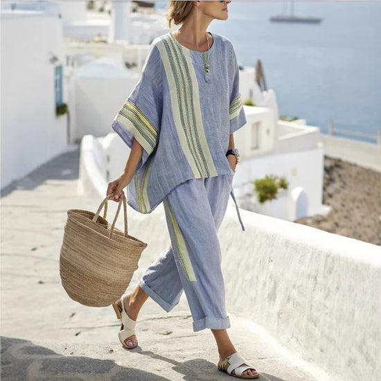 Women’s summer striped batwing sleeve top with solid straight-leg pants two-piece set.