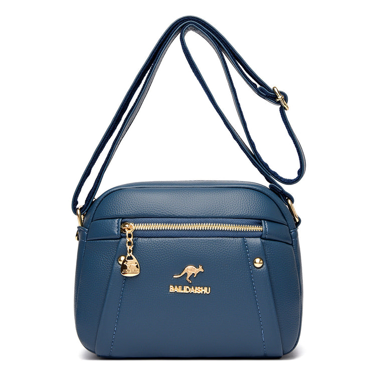 Women’s small round crossbody bag made of genuine leather, lightweight and stylish.