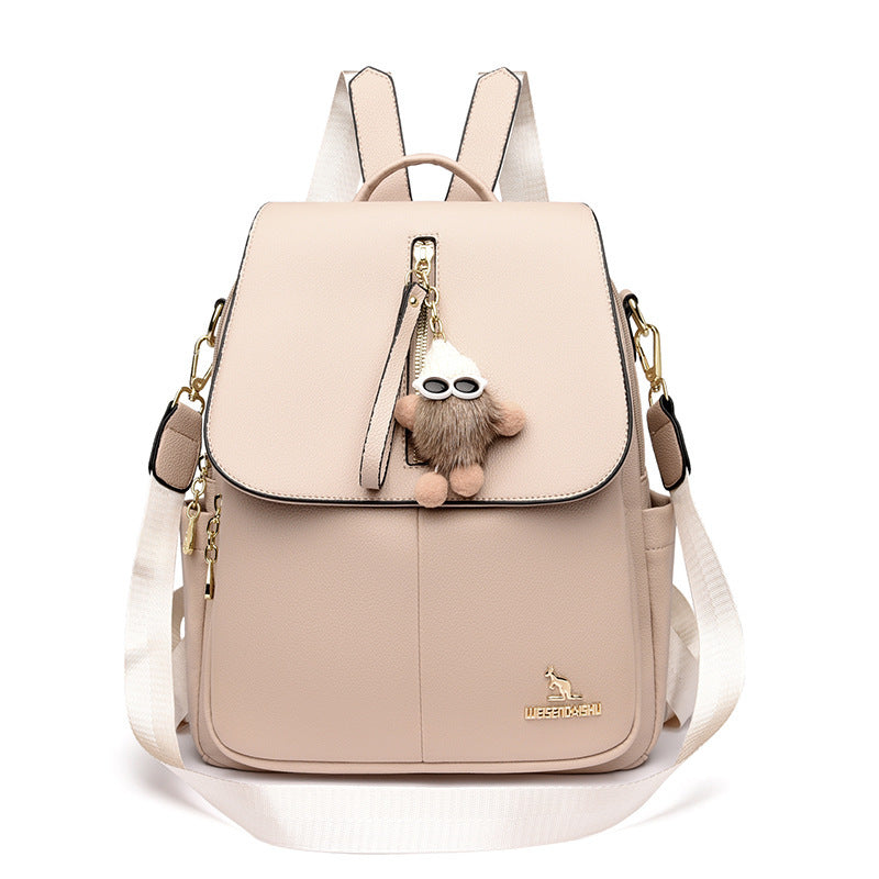 Women’s genuine leather backpack with pendant, soft and anti-theft design.