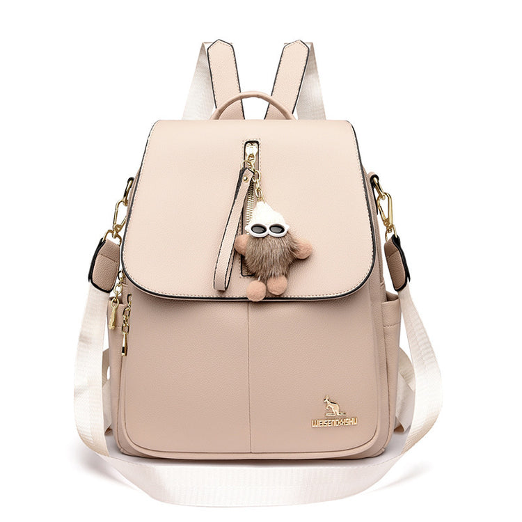 Women’s genuine leather backpack with pendant, soft and anti-theft design.
