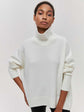 Women’s winter turtleneck sweater solid color long sleeve pullover.