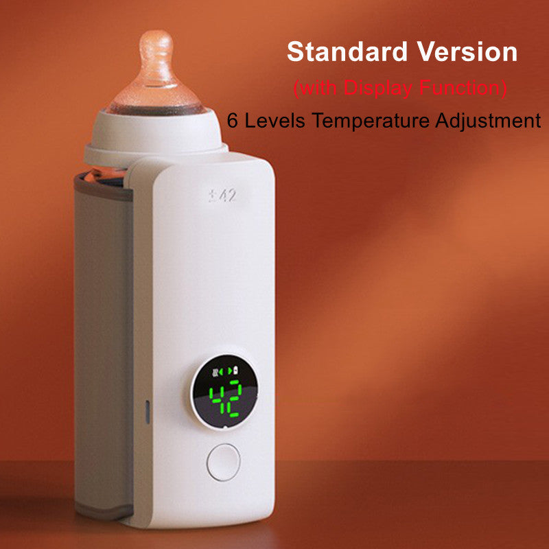 Portable USB baby bottle warmer with wrap-around heating design.
