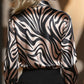 Women’s abstract print V-neck button-down blouse, long sleeve casual top.