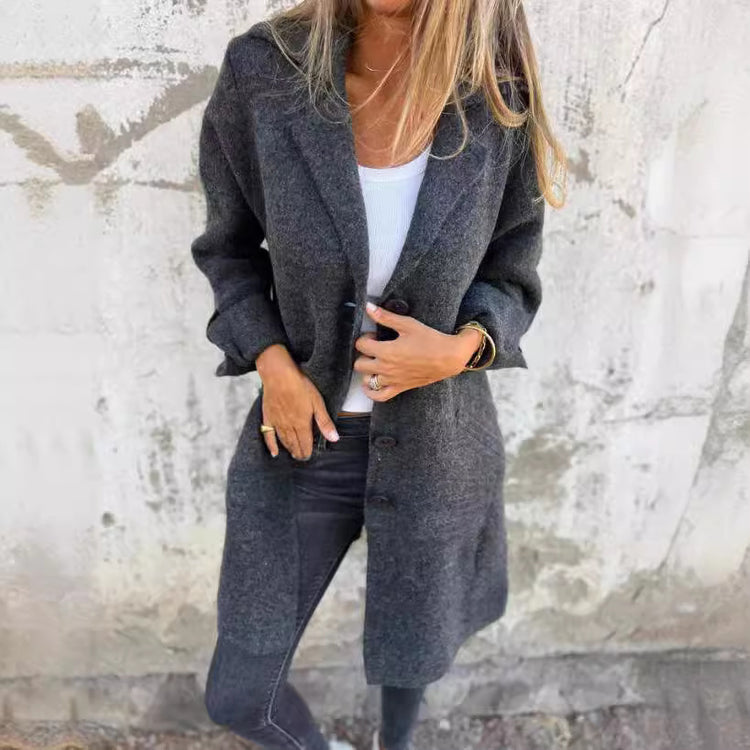 Women’s lapel single-breasted mid-length cardigan coat with pockets.