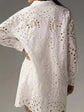Women’s white solid color hollow buckle lapel shirt, loose fit daily top.